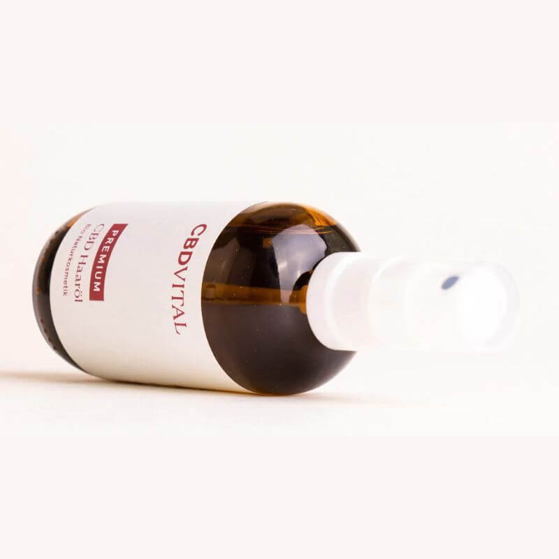 CBD Vital Haaröl liegende Flasche