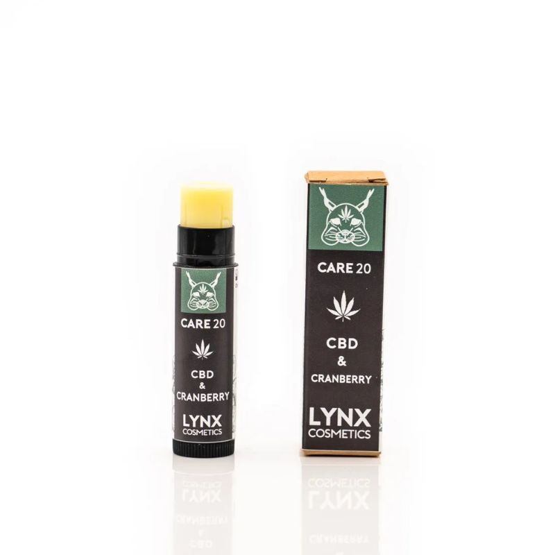 Lynx Cosmetics CBD & Cranberry Care 20 Lippenbalsam neben der dazugehörigen Verpackung
